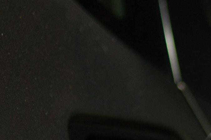 manguera de gasolina en el tanque del auto