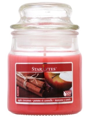 frasco de vidrio con vela aromática