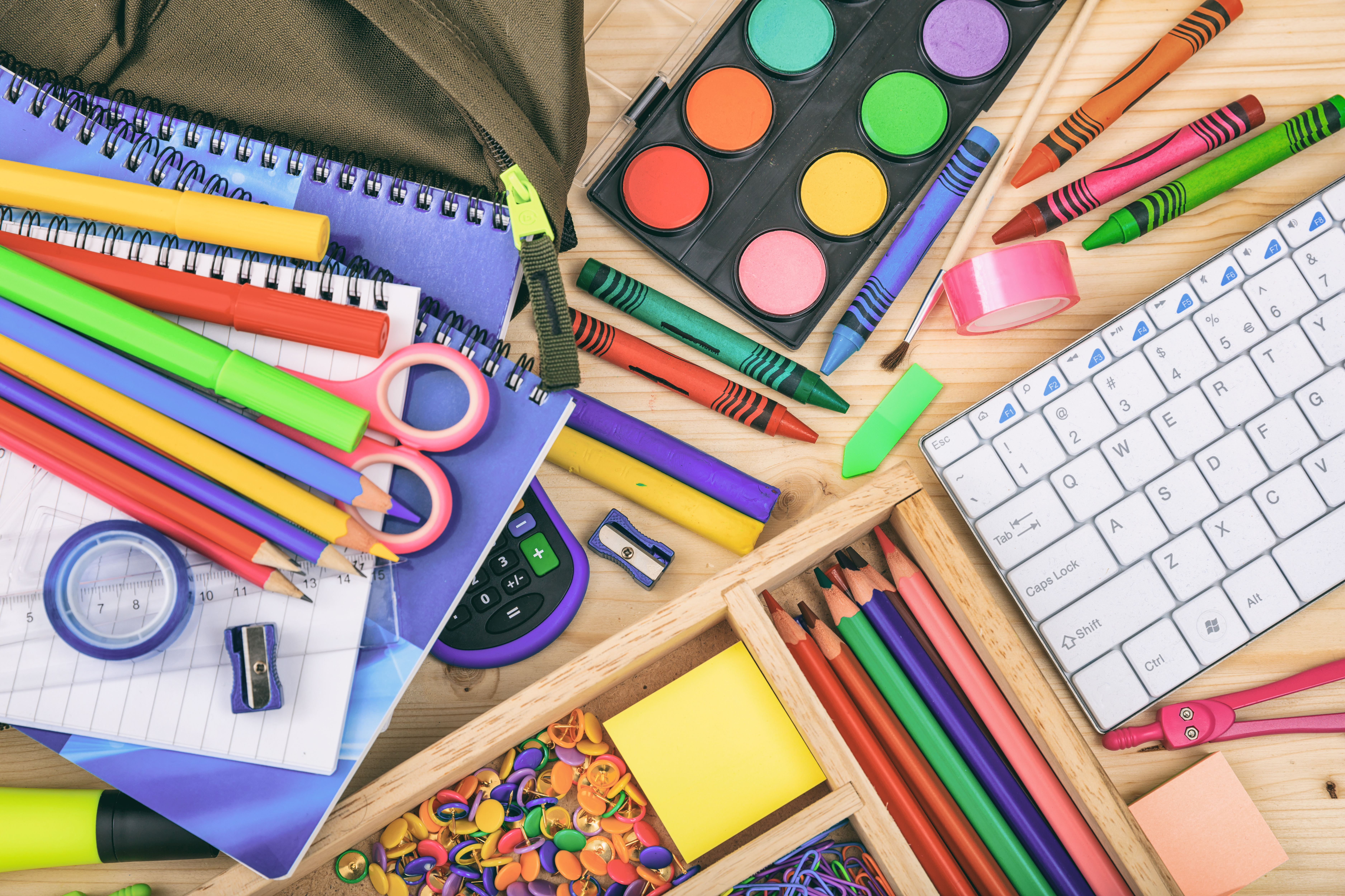 Variety,Of,School,Supplies,On,Wooden,Background