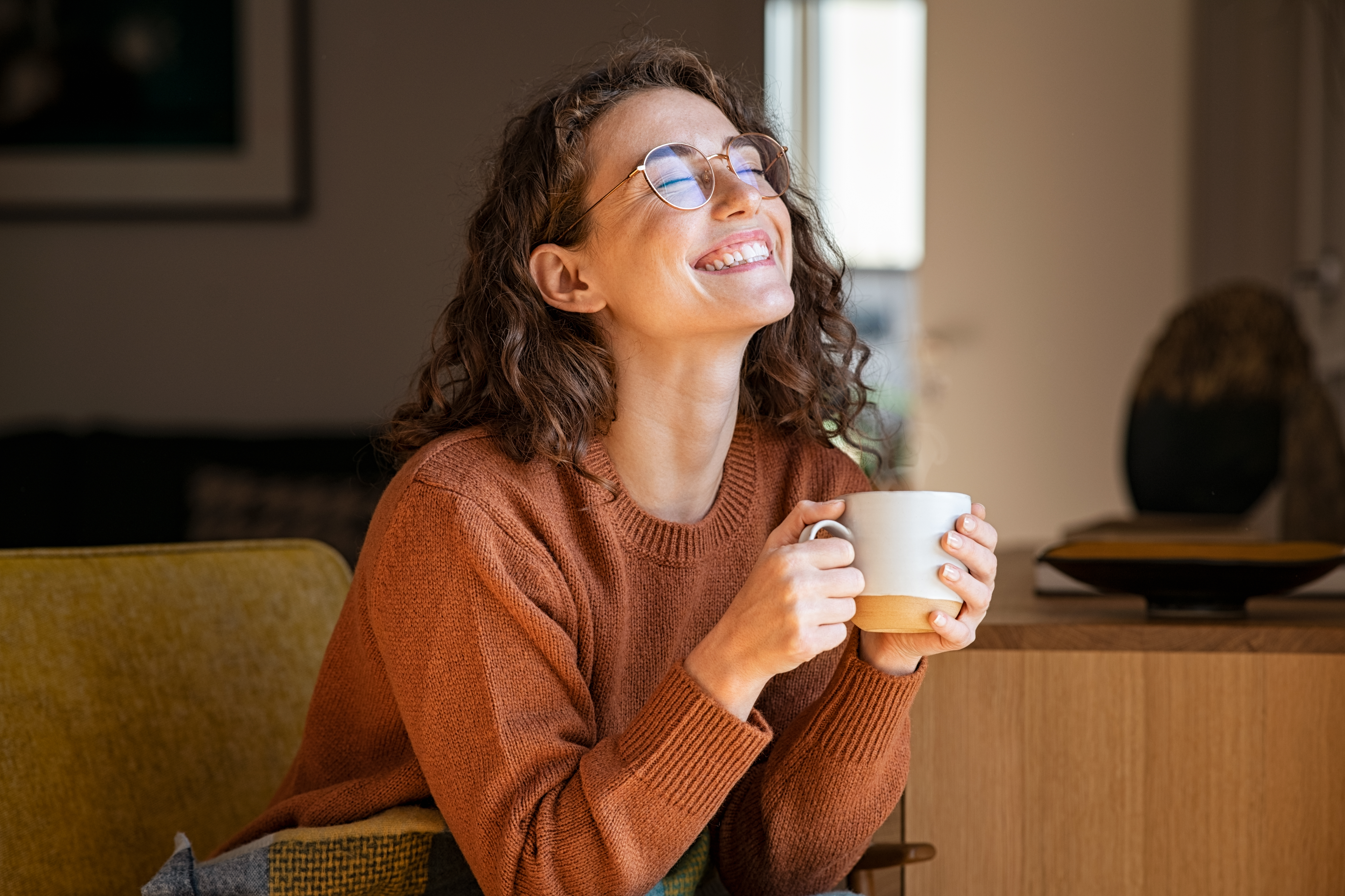 Portrait,Of,Joyful,Young,Woman,Enjoying,A,Cup,Of,Coffee