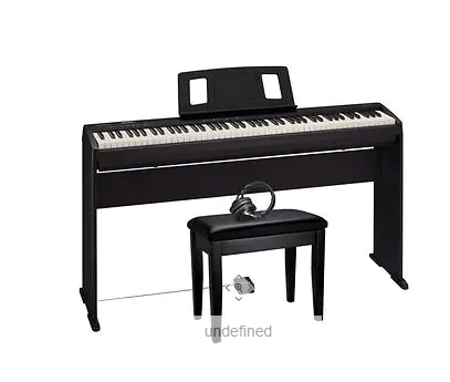 Piano digital con audífonos y pedal Roland