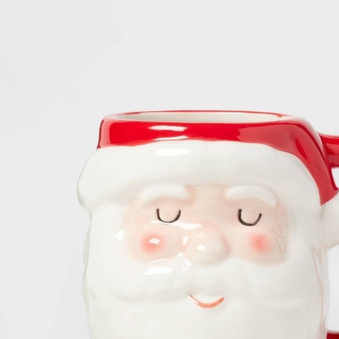 Taza de chocolate con cara de santa Wondershop