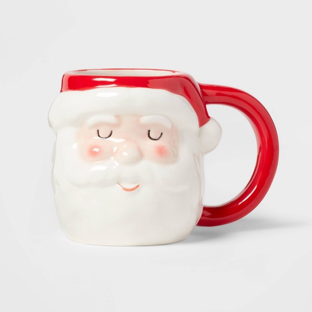 Taza de chocolate con cara de santa Wondershop