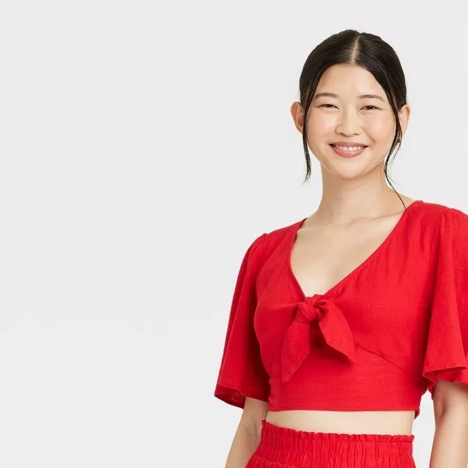 Blusa de corte bajo para dama con lazo en escote A New Day