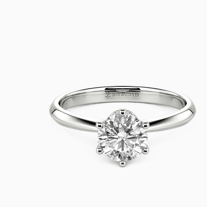 Anillo de compromiso con piedra lateral y de corte redondo She Say Yes