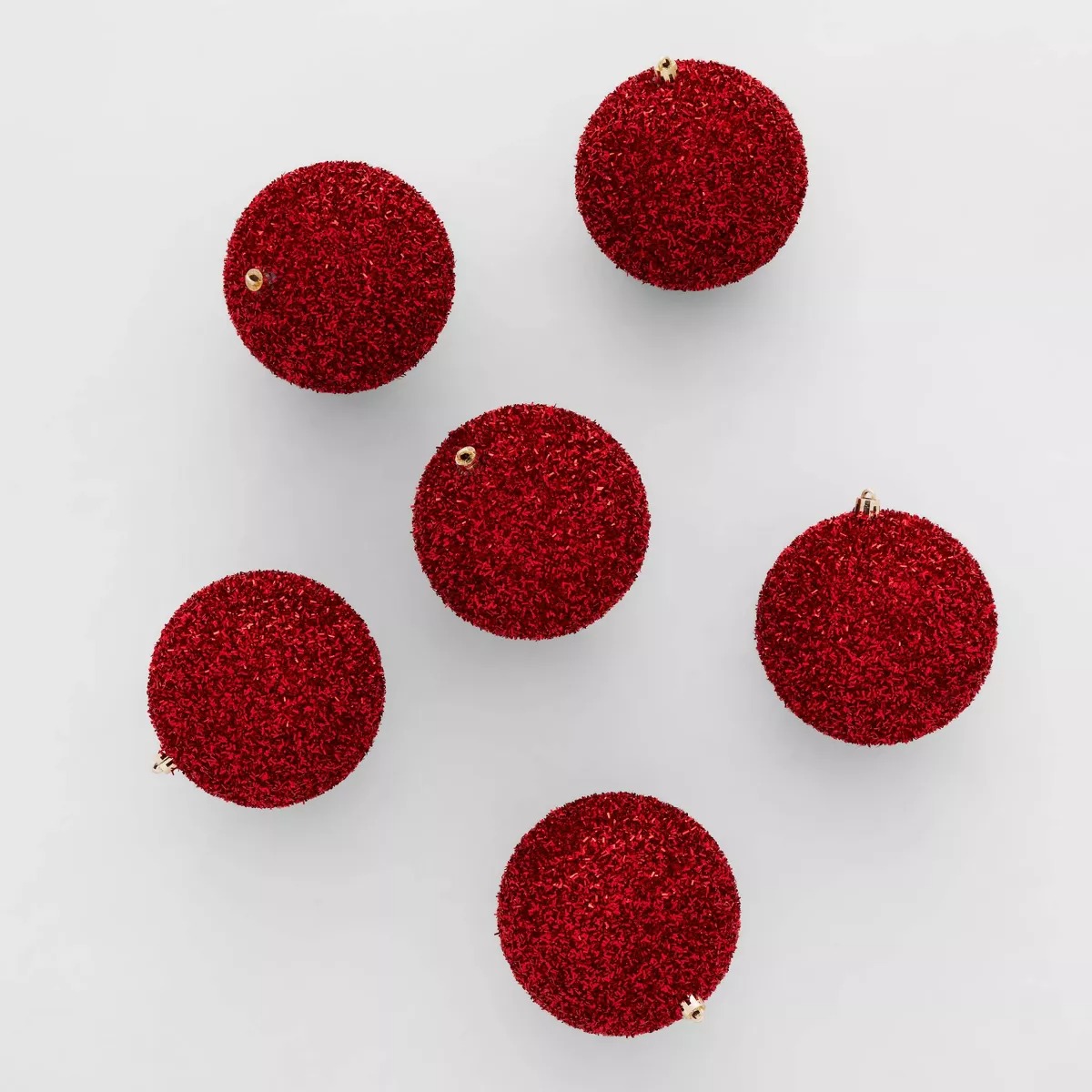 Bambalinas rojas brillantes para decorar en Navidad