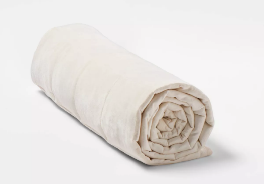 Envuélvete en comodidad y ahorra con la manta ponderada de 12 libras de Tranquility, ahora a solo $29.40 en Target. Con un descuento del 40%, esta manta es perfecta para noches acogedoras. ¡Haz tu pedido en línea antes de que se agoten!