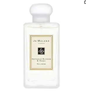 Jo Malone: Un viaje olfativo único. La colonia con flor de nectarina y miel ofrece una experiencia floral inigualable. ¡Indulgencia perfumada a tu alcance!